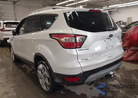 2017 Ford Escape Titanium z USA, uszkodzony, nr VIN 1FMCU9J93HUC69256